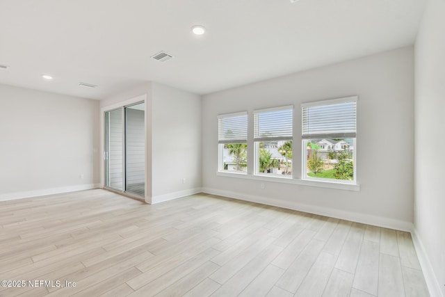 10266 Element Rd, Jacksonville, FL 32256 - unfurnished room featuring light wood-type flooring, baseboards, and recessed lighting