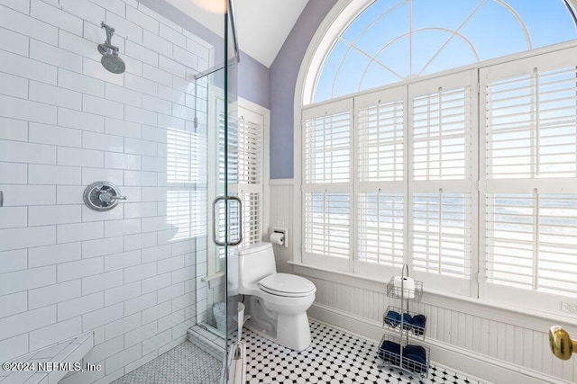 2807 S Ponte Vedra Blvd, Ponte Vedra Beach, FL 32082 - full bath featuring wainscoting, a stall shower, toilet, tile patterned flooring, and a decorative wall