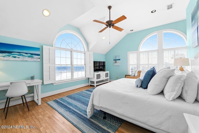 bedroom with light hardwood / wood-style flooring, multiple windows, and ceiling fan