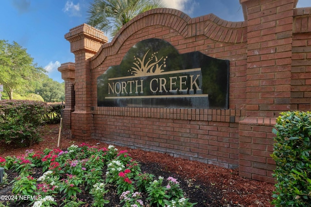 view of community sign