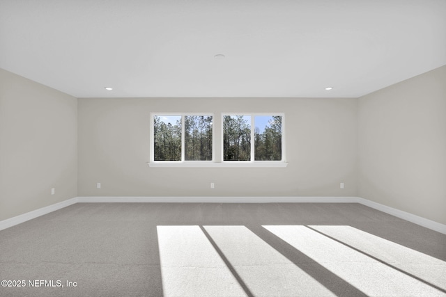 empty room featuring carpet floors