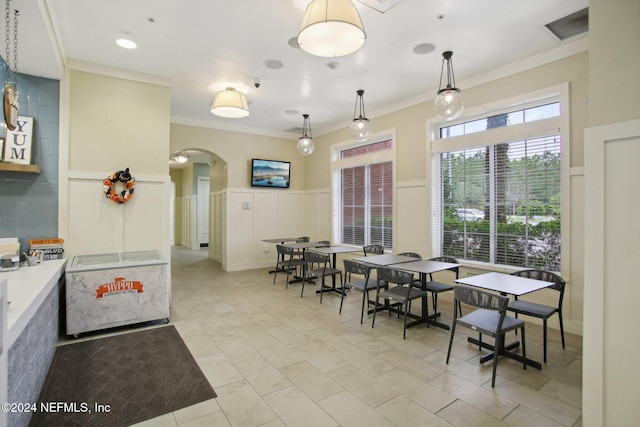 tiled dining area with ornamental molding