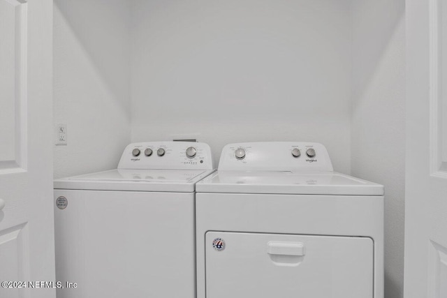 laundry area featuring separate washer and dryer