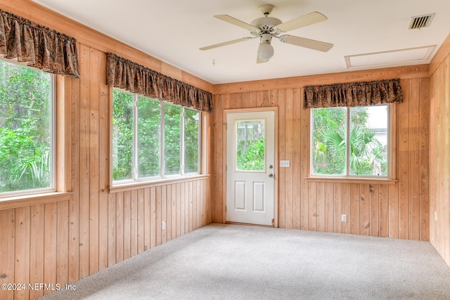 interior space featuring wood walls