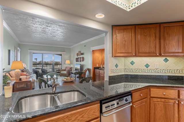 kitchen with dark stone countertops, backsplash, crown molding, and dishwasher