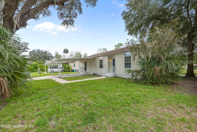 view of front of home with a front yard