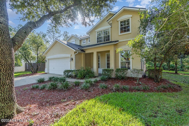 view of front property with a garage