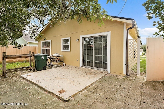 rear view of house with a patio