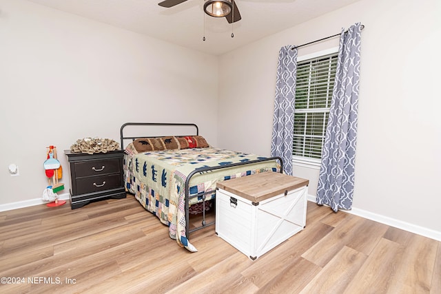 bedroom featuring ceiling fan and light wood-type flooring