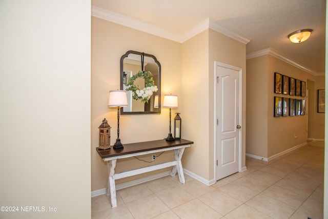 hall featuring ornamental molding and light tile patterned flooring