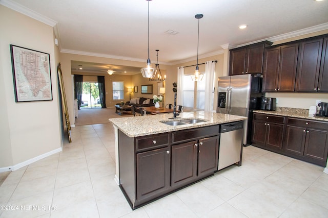 kitchen with dark brown cabinets, dishwasher, decorative light fixtures, and sink