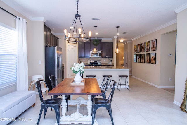 dining room featuring ornamental molding and a chandelier