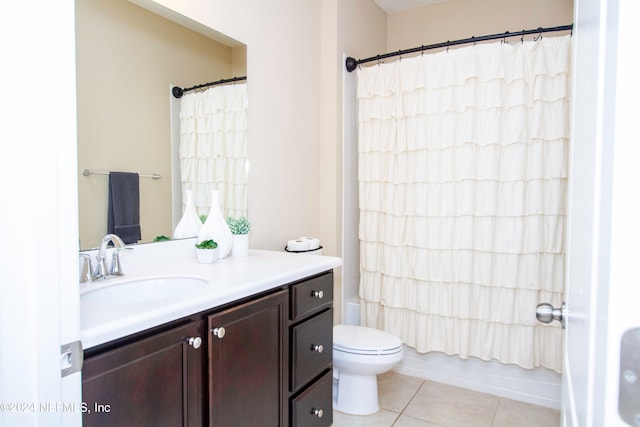 full bathroom featuring shower / tub combo, tile patterned floors, vanity, and toilet