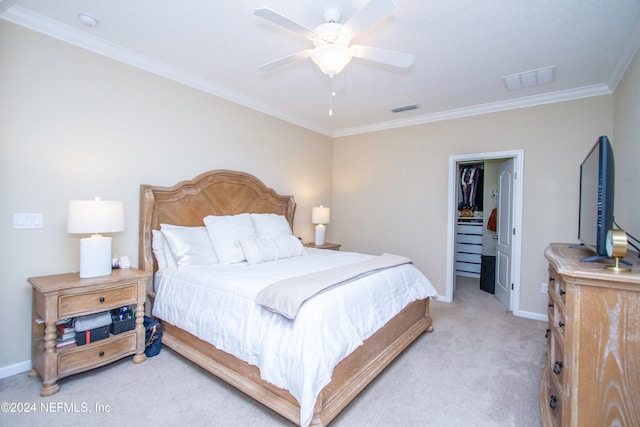 bedroom featuring ceiling fan, light colored carpet, and ornamental molding