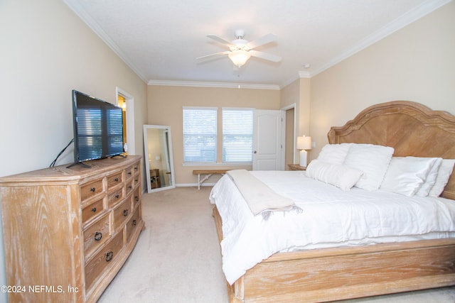 bedroom with ceiling fan, light colored carpet, and ornamental molding