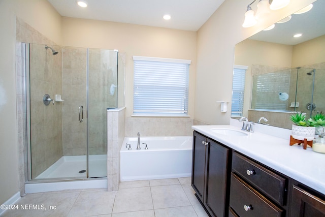 bathroom with vanity, separate shower and tub, and tile patterned floors