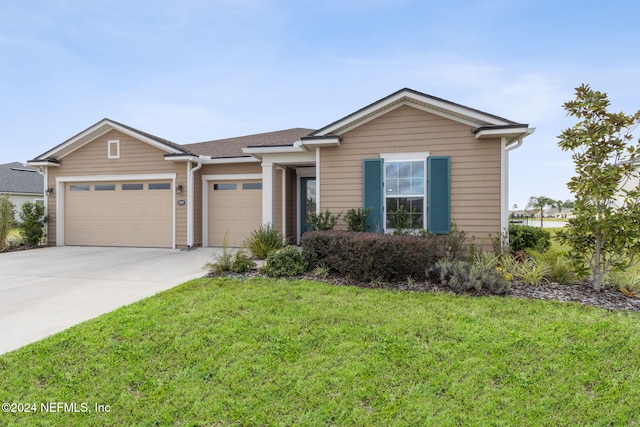 single story home featuring concrete driveway, a front lawn, a shingled roof, and a garage