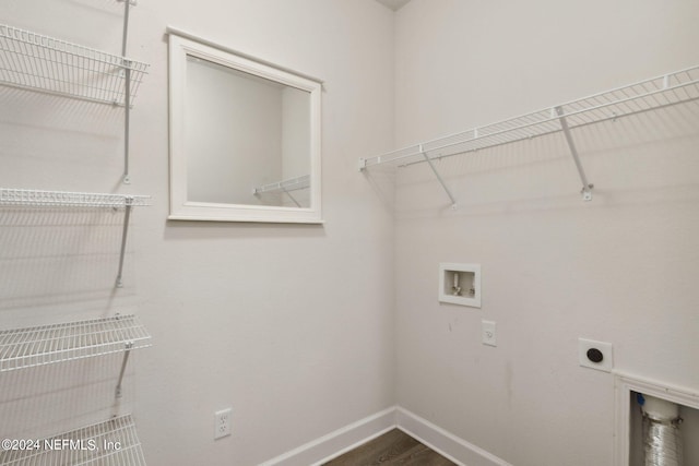 laundry room featuring laundry area, hookup for an electric dryer, baseboards, washer hookup, and dark wood-style flooring