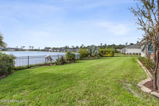 view of yard with a water view