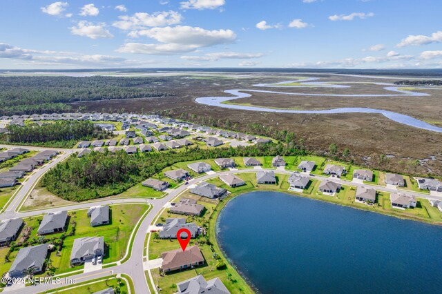 drone / aerial view with a water view