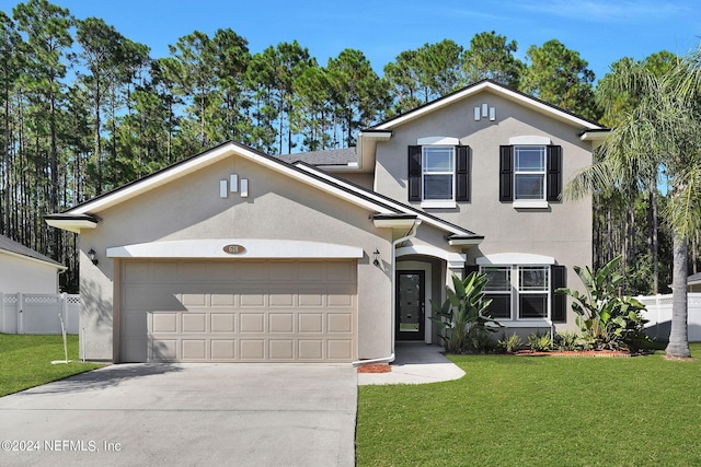 front of property with a garage and a front yard