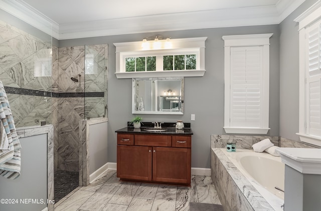 bathroom with ornamental molding, vanity, and shower with separate bathtub