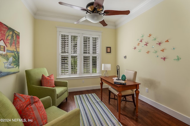 office area with dark wood-type flooring, crown molding, and ceiling fan