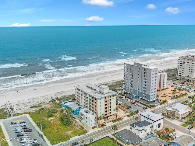 aerial view with a view of the beach and a water view