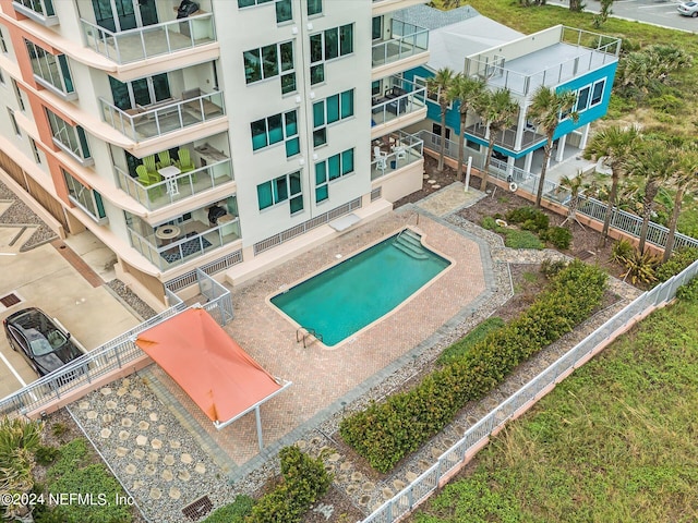 view of swimming pool with a patio area