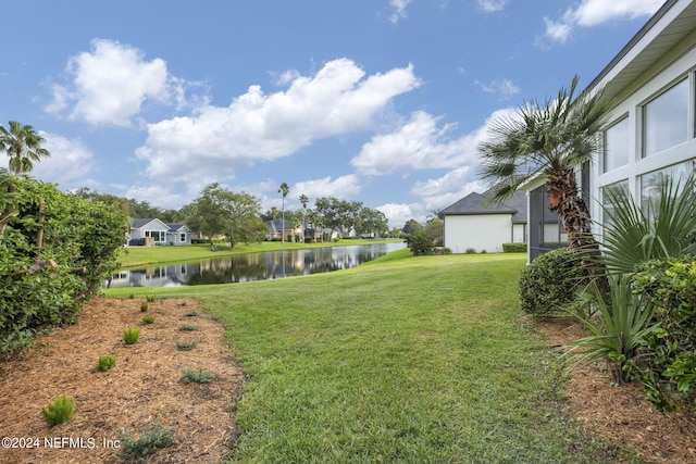 view of yard with a water view