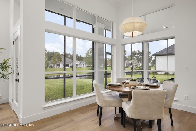 sunroom featuring a healthy amount of sunlight