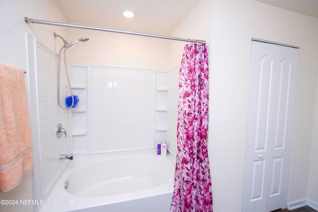 bathroom featuring shower / bath combination with curtain