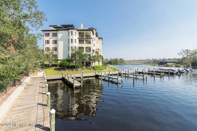 view of dock with a water view