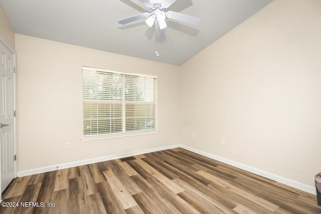 8121 Summer Palm Ct, Jacksonville, FL 32256 - empty room featuring a ceiling fan, baseboards, lofted ceiling, and wood finished floors