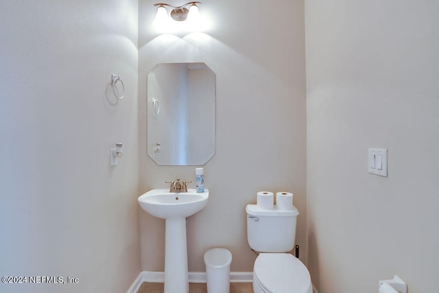 bathroom featuring toilet