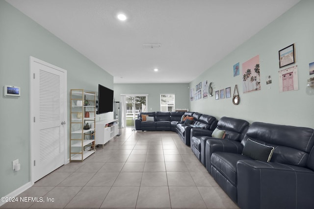 living room with light tile patterned floors