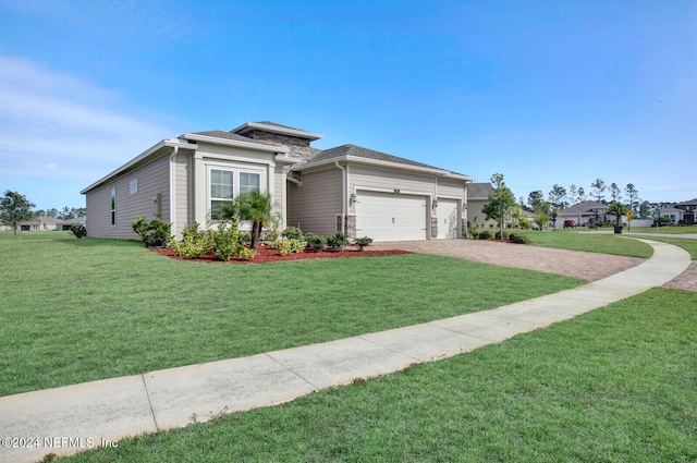 view of front facade featuring a garage and a front yard