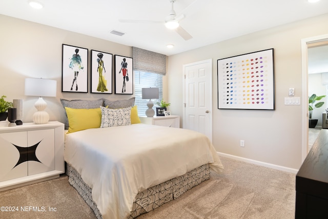 carpeted bedroom with ceiling fan