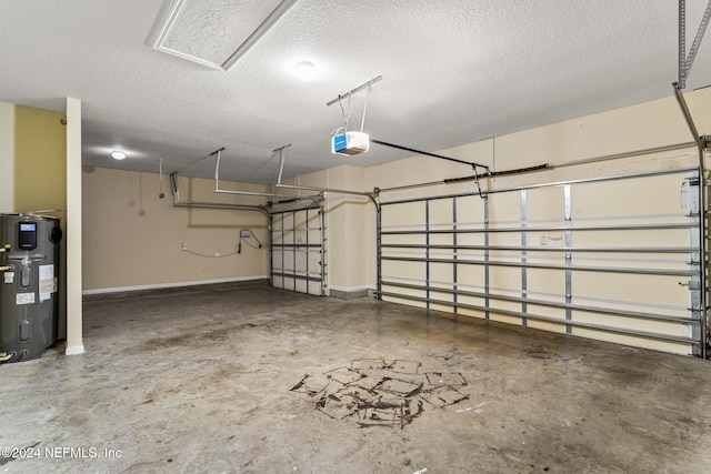 garage with water heater and a garage door opener