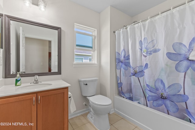 full bathroom with vanity, shower / bath combo, toilet, and tile patterned floors