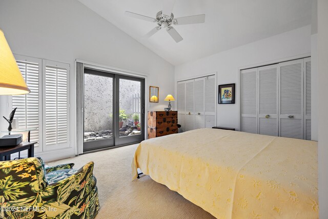 bedroom featuring ceiling fan, carpet, access to exterior, two closets, and vaulted ceiling