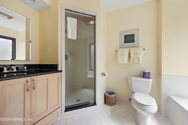 full bathroom with vanity, tile patterned flooring, toilet, and shower with separate bathtub