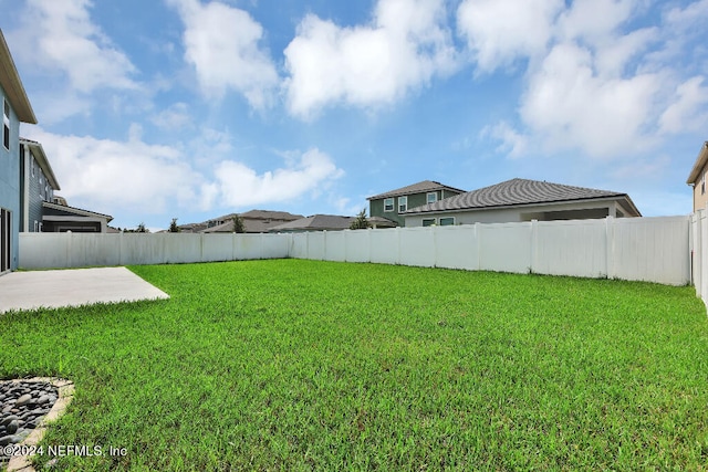 view of yard with a patio area