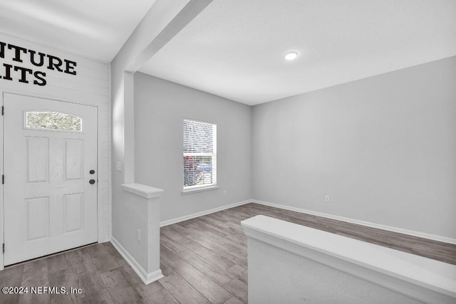 entrance foyer featuring hardwood / wood-style flooring