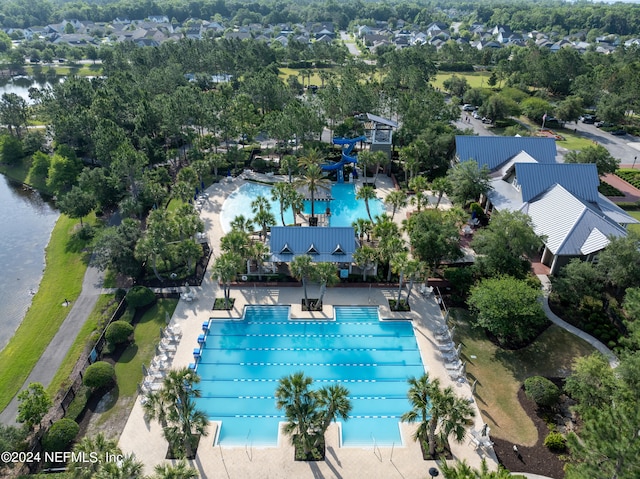 birds eye view of property featuring a water view