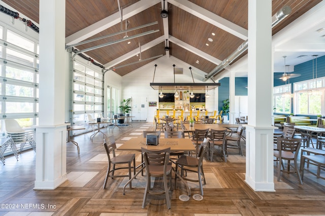 dining room featuring parquet flooring, high vaulted ceiling, plenty of natural light, and wooden ceiling