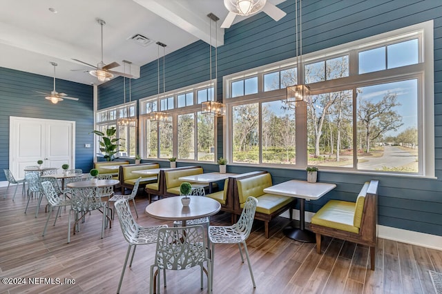 sunroom with beam ceiling