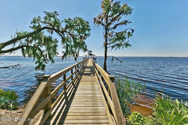 dock area featuring a water view