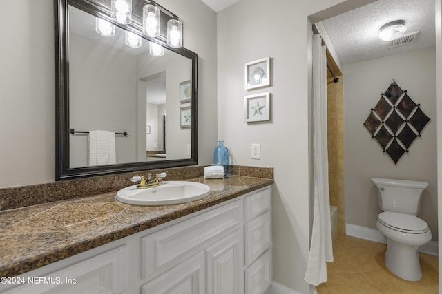 full bathroom featuring shower / bath combo, toilet, tile patterned flooring, vanity, and a textured ceiling