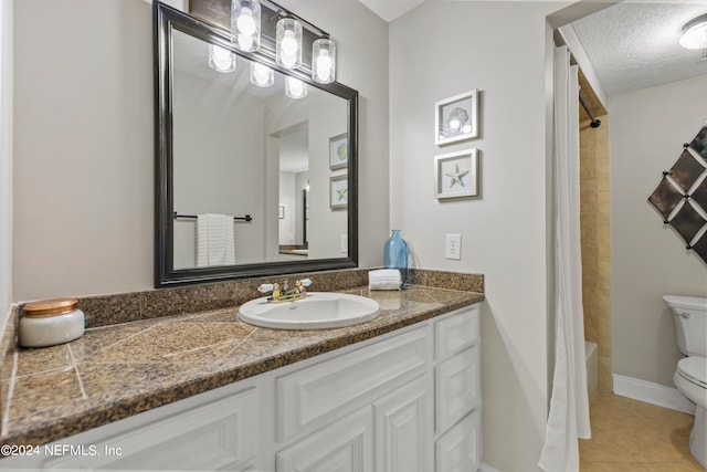 full bathroom with toilet, tile patterned flooring, vanity, a textured ceiling, and shower / bathtub combination with curtain